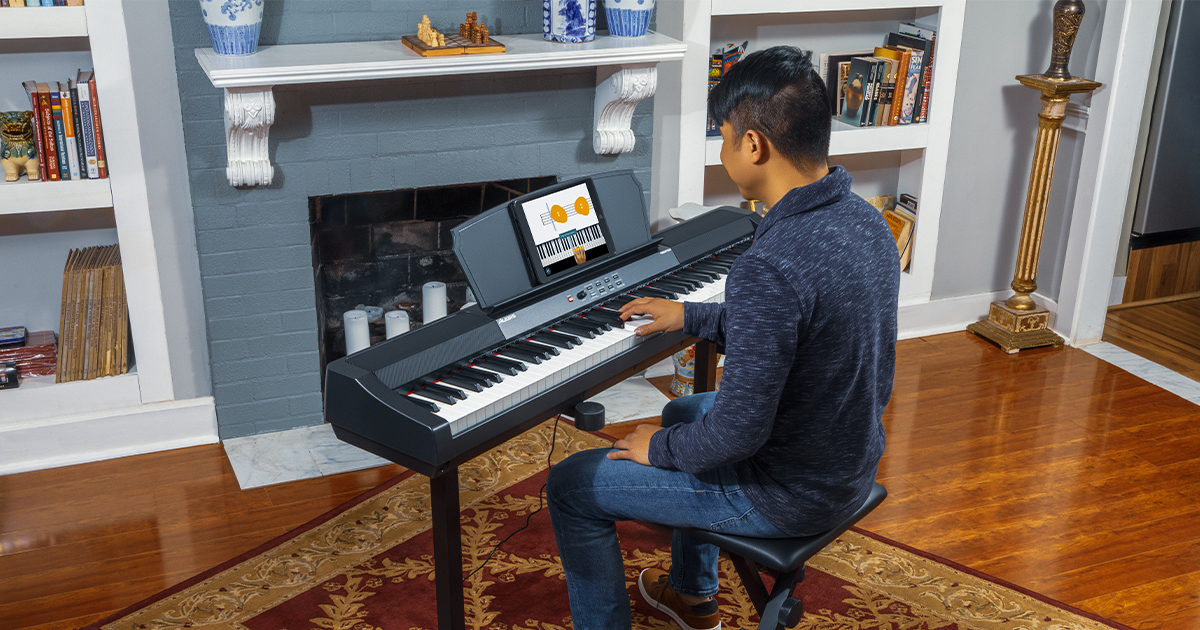 Alesis Prestige pianoforte digitale con tastiera 88 tasti a pesatura graduale, 16 suoni multicampionati, modalità Split, Layer, Lesson e Record, metronomo, con casse integrate 50W e USB MIDI